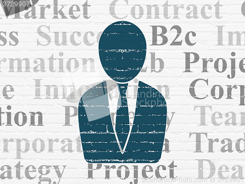 Image of Finance concept: Business Man on wall background