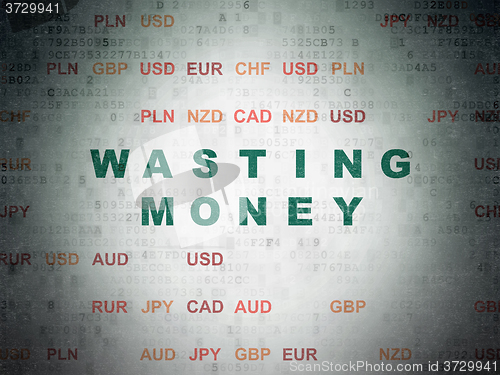 Image of Money concept: Wasting Money on Digital Paper background