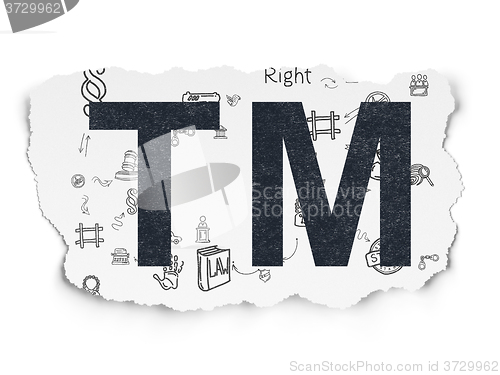 Image of Law concept: Trademark on Torn Paper background