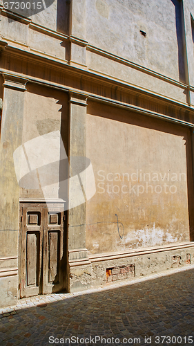 Image of old brick italian facade with door