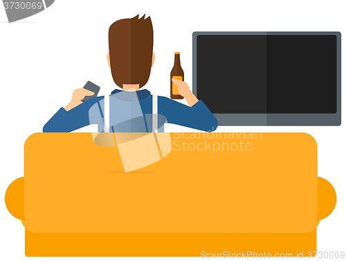 Image of Man watching TV.