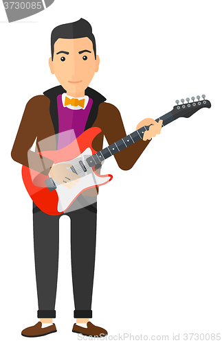 Image of Musician playing electric guitar.