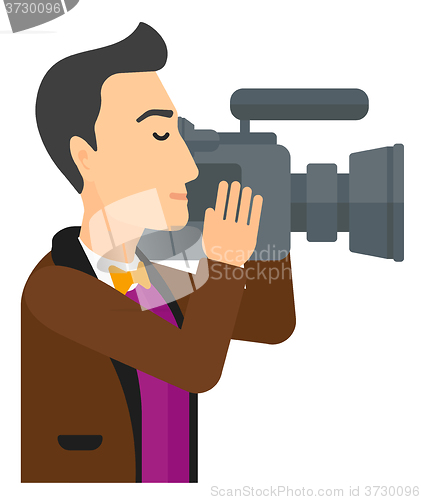 Image of Cameraman with video camera.