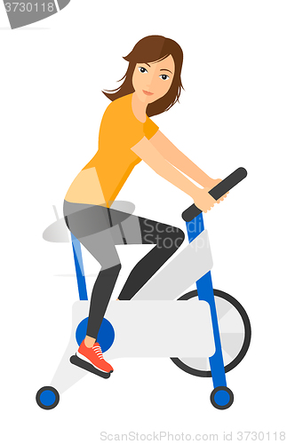 Image of Woman doing cycling exercise.