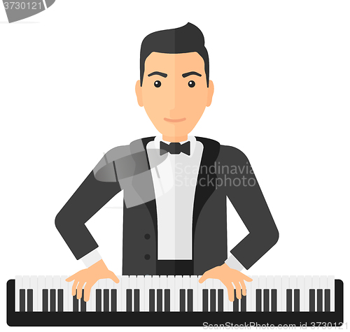 Image of Man playing piano.