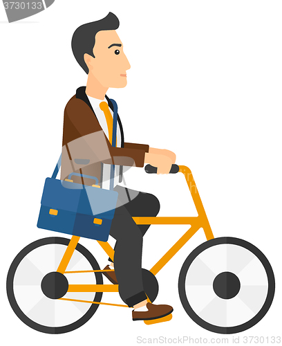 Image of Man cycling to work.