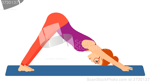 Image of Woman practicing yoga.