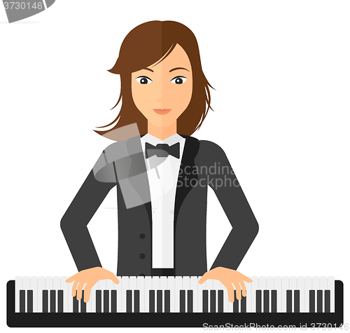 Image of Woman playing piano.