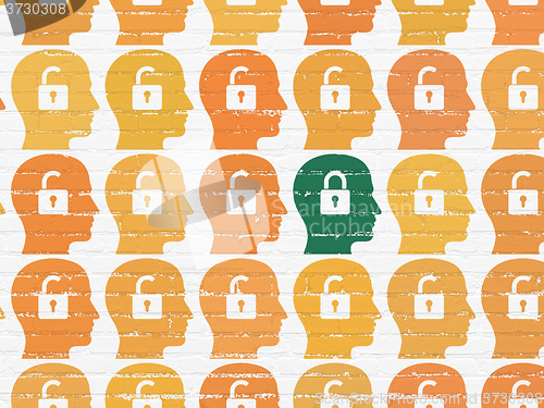 Image of Safety concept: head with padlock icon on wall background