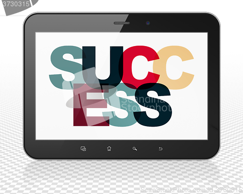 Image of Business concept: Tablet Pc Computer with Success on  display