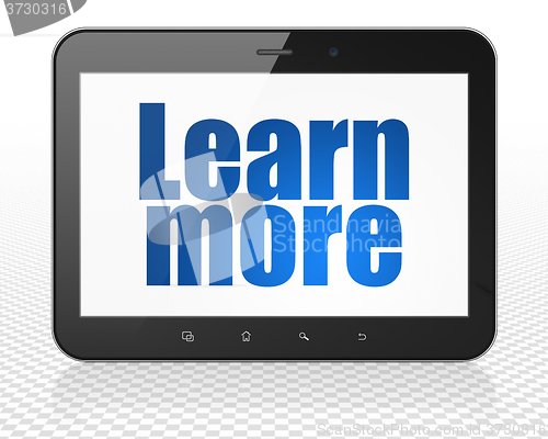 Image of Education concept: Tablet Pc Computer with Learn More on display