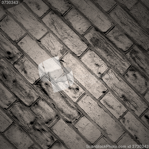 Image of in london abstract    texture of a ancien wall and ruined brick