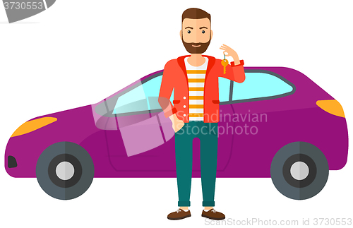 Image of Man holding key from new car.