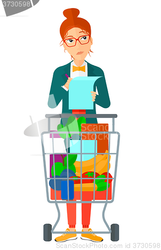 Image of Woman with shopping list. 