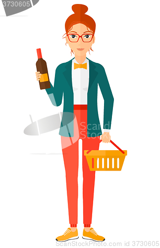 Image of Customer with shopping basket and bottle of wine.