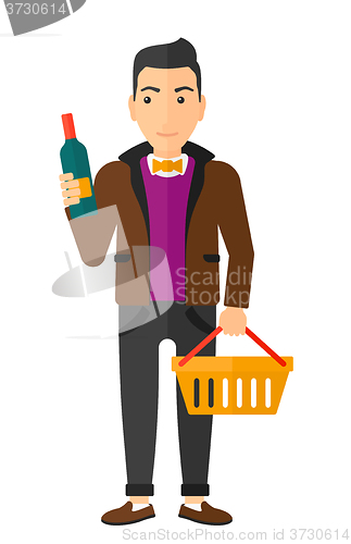 Image of Customer with shopping basket and bottle of wine.