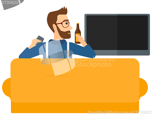 Image of Man watching TV.