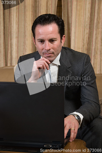 Image of Man surfing the net