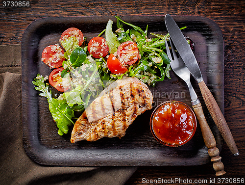 Image of Quinoa and vegetable salad and grilled chicken fillet