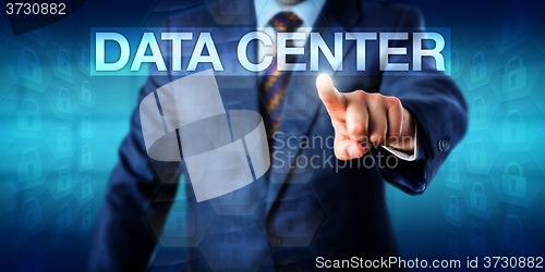 Image of IT Manager Pressing DATA CENTER Onscreen