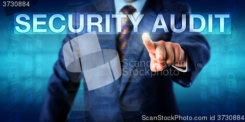 Image of Auditor Pressing SECURITY AUDIT Onscreen