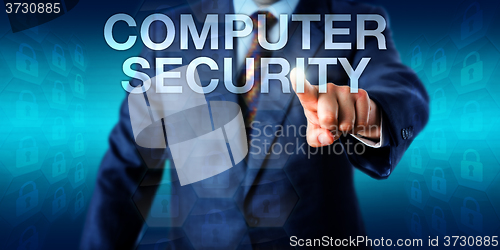Image of Manager Pushing COMPUTER SECURITY Onscreen