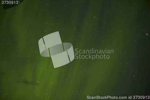 Image of Northern lights with bright stars in Iceland