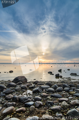 Image of Beautiful sunrise on the sea. Views of Tallinn.