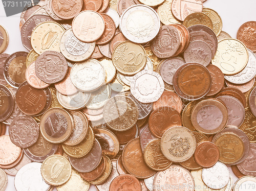 Image of  Euro and Pounds coins vintage