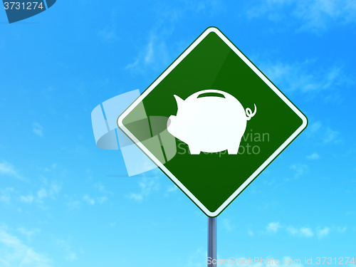 Image of Currency concept: Money Box on road sign background