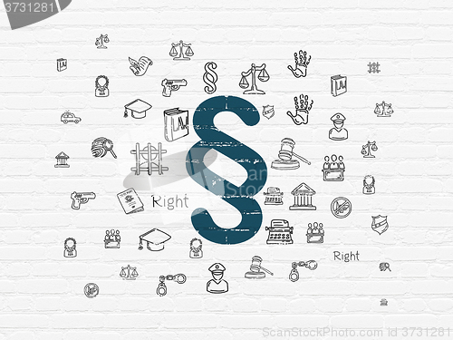 Image of Law concept: Paragraph on wall background
