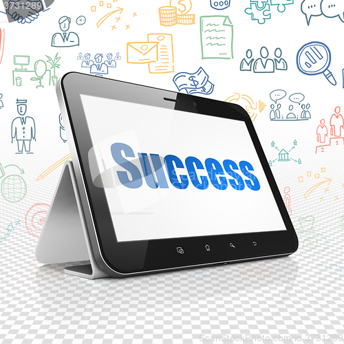 Image of Finance concept: Tablet Computer with Success on display