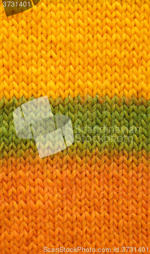 Image of Stocking stitch in yellow, green and orange background