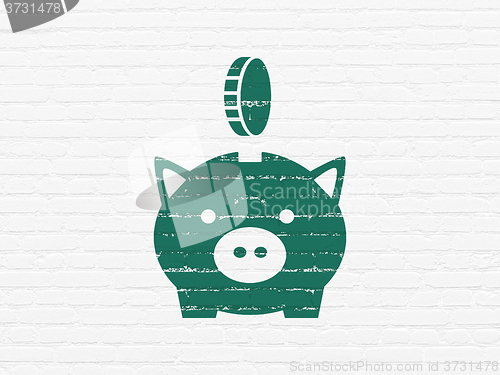 Image of Currency concept: Money Box With Coin on wall background