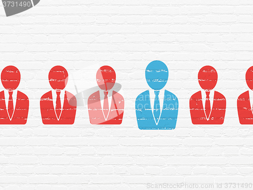 Image of Business concept: business man icon on wall background