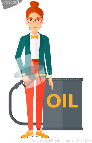 Image of Woman with oil can and filling nozzle.