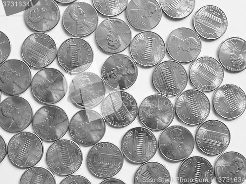 Image of Black and white Dollar coins 1 cent