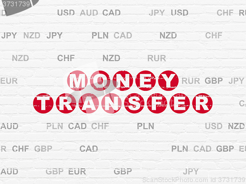 Image of Currency concept: Money Transfer on wall background