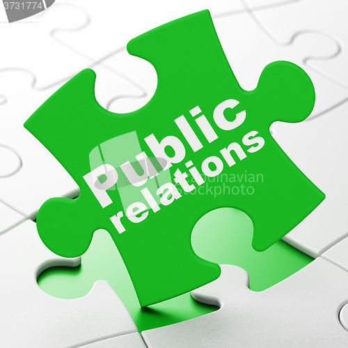 Image of Advertising concept: Public Relations on puzzle background