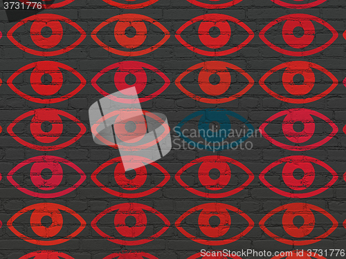 Image of Safety concept: eye icon on wall background