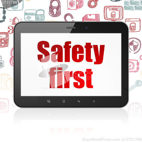 Image of Privacy concept: Tablet Computer with Safety First on display