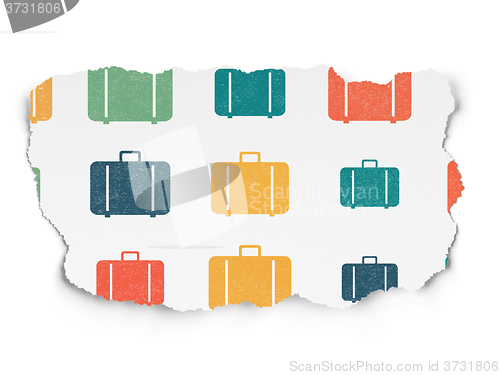 Image of Travel concept: Bag icons on Torn Paper background