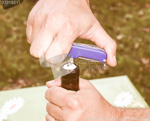 Image of Retro looking Bottle opening