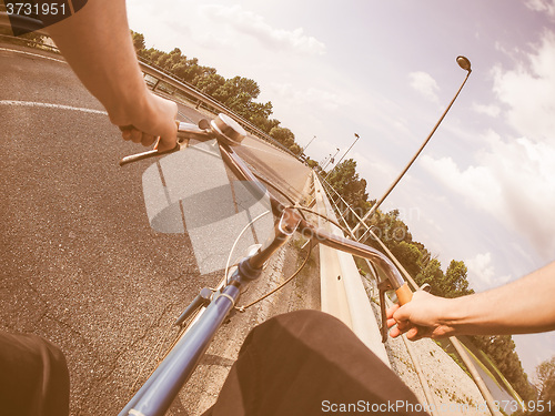 Image of  Riding a bike vintage