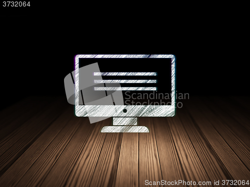 Image of Web design concept: Monitor in grunge dark room