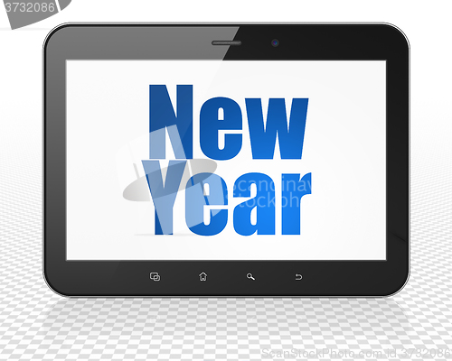 Image of Holiday concept: Tablet Pc Computer with New Year on display