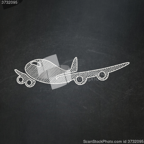 Image of Tourism concept: Airplane on chalkboard background