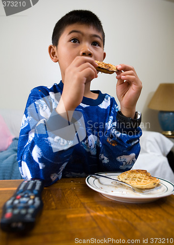 Image of Breakfast in front of the television