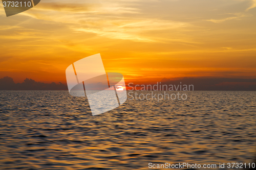 Image of sunrise boat  and kho tao bay coastline south china sea