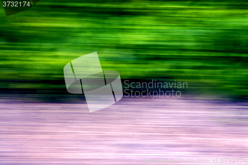 Image of  abstract of a  green pink street